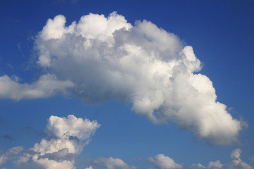 White of clouds on the sky in the blue day at summer under sunlight.Use for background or wallpaper.