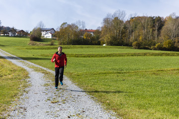 Fototapeta premium Male athlete working out in fresh air
