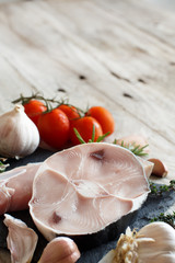 Two shark steak with vegetables and herbs