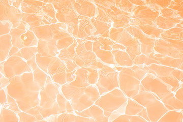 Surface of orange swimming pool texture background, Water in swimming pool.