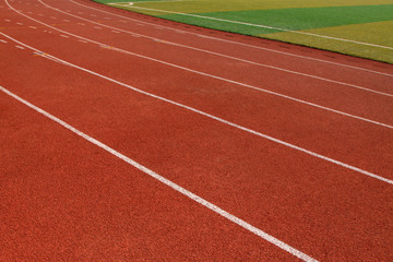 Fototapeta premium red plastic runway in a sports ground, in Beijing, China