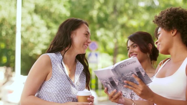 tourism and travel concept - tourists with city guide asking local woman for help