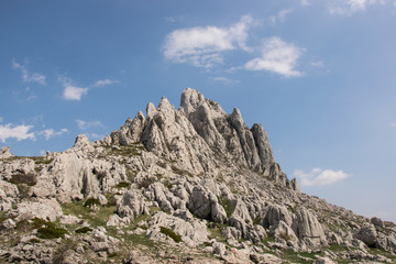Fototapeta na wymiar Tulove grede are extraordinary karst phenomena within the Southern Velebit Mountain, Croatia. They are among highest natural rock pillars. Site of Winnetou filming.