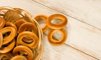 image of bagels on wooden table close-up