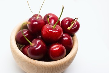 Cherries in wooden bowl