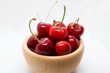 Cherries in wooden bowl