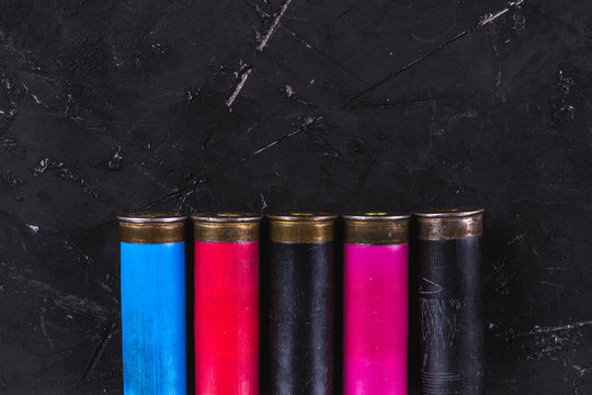 Cartridges on a black background. Copy sace. Hunting