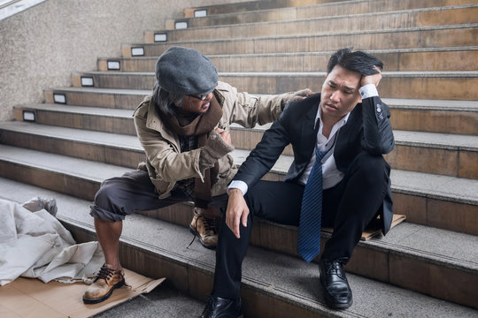homeless man cheer up sad businessman