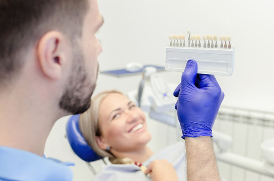 Woman on teeth bleaching at dentist office