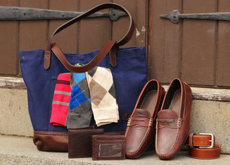 A leather bag with socks, wallets, shoes and other genuine leather goods. © Ryan Garrett