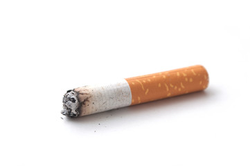 closeup of isolated cigarette butt on white background