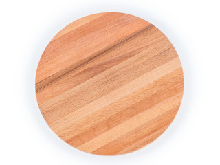 Round wooden cutting board isolated with clipping path