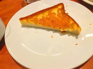 Slices of toast bread on wooden table.