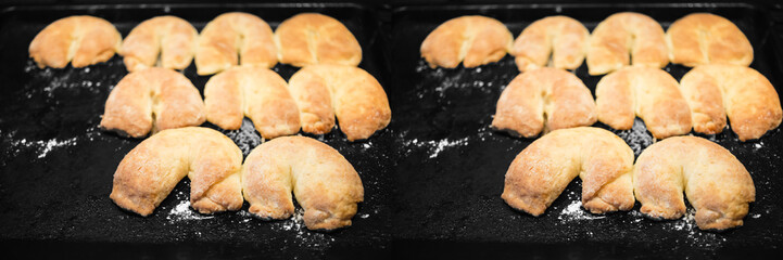 Baked crescent rolls on cooking sheet, Selective focus. Wide panoramic image.