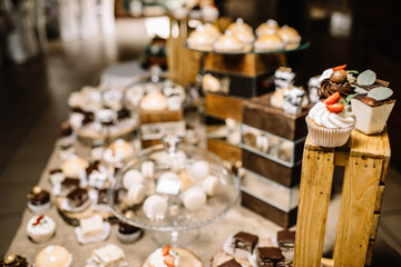 Candy Bar. Delicious sweet buffet with cupcakes. 