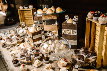 Candy Bar. Delicious sweet buffet with cupcakes. 