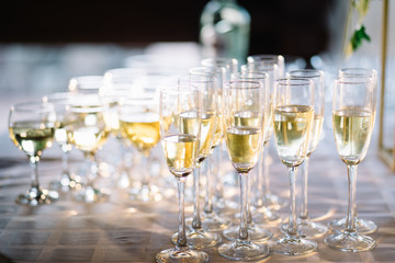 Festive table setting with champagne. champagne glasses close up