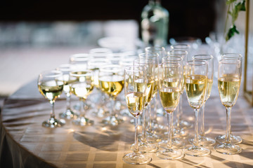 Festive table setting with champagne. champagne glasses close up