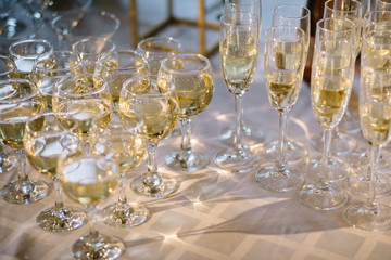 Festive table setting with champagne. champagne glasses close up