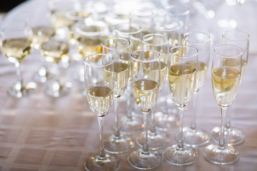 Festive table setting with champagne. champagne glasses close up
