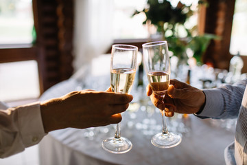 Festive table setting with champagne. champagne glasses close up