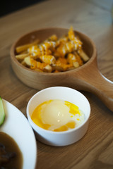 Shot of protein filled soft-boiled eggs served in a white round bowl