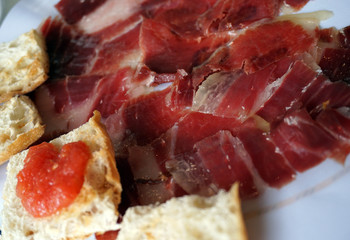 Obraz premium Iberian ham, glass bread