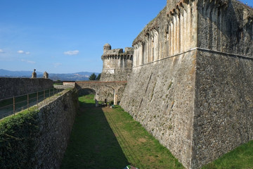 Fototapeta na wymiar Medieval fortress walls in Sarzana city, Italy