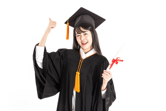 Beautiful Attractive Asian woman graduated in cap and gown smile with certificated in her hand feeling so proud and happiness,Isolated on white background,Education Success Concept