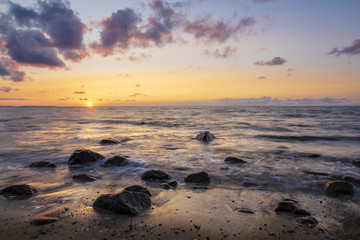 Fototapeta na wymiar Romantic sunset over the sea beach, baltic sea, Poland