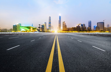 Obraz premium Empty road floor surface with modern city landmark buildings of guangzhou bund Skyline