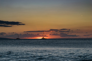 Sailboats at sunset 