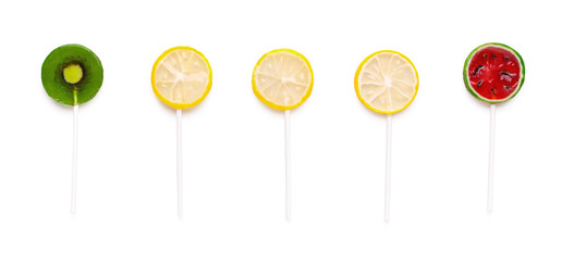 Citrus, kiwi and watermelon lollipops isolate don white