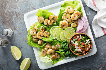 Spicy shrimp lettuce wraps with salsa