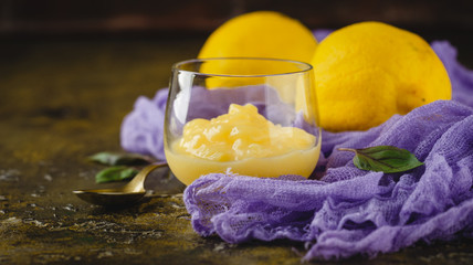 Lemon curd and fresh lemons