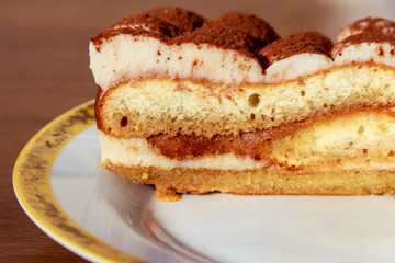 Traditional italian dessert tiramisu on a table