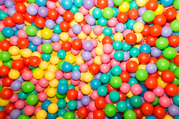 Background of colorful plastic balls on children's playground
