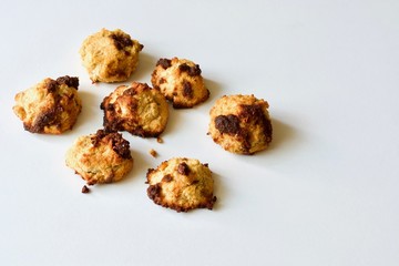 Tasty coconut cookies on the white background