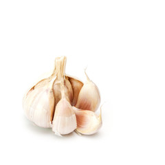 Raw garlic on white.