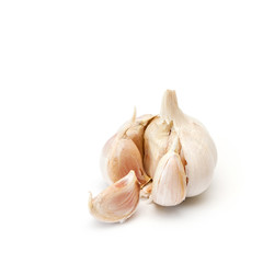 Raw garlic on white.