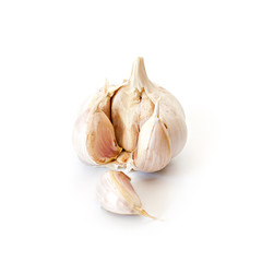 Raw garlic on white.