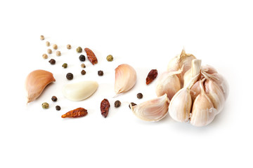 Raw garlic segments and peppers.