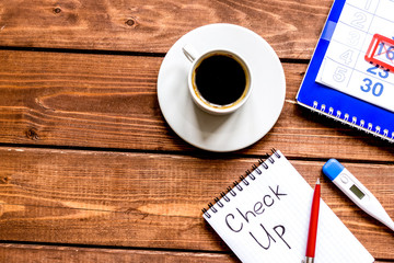 concept time health check up on wooden background