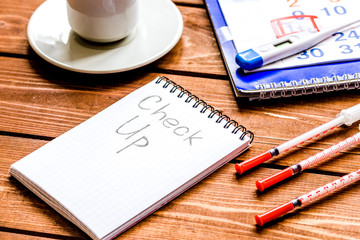 concept time health check up on wooden background