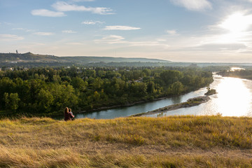 Mother and son admiring the landscape at Bowmont Park in Calgary