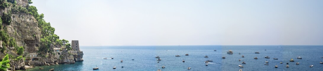 Coastline of Italian city Positano. Summer sunny day. Vacation abstract photo.