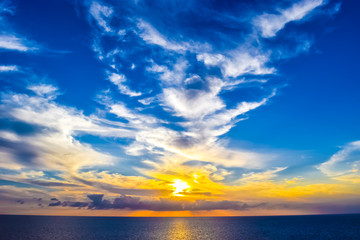 Amazing artwork of clouds at sunset in the Caribbean.