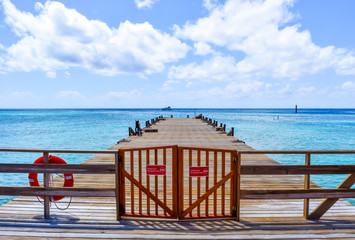 Boardwalk/Pier from a tropical Caribbean beach into the ocean