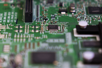 Obraz premium Lcd tv electronic circuit. Green color, faded at the sides.