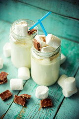 Chocolate Nice cream on wooden background, copy space. Homemade vegan - healthy summer dessert.